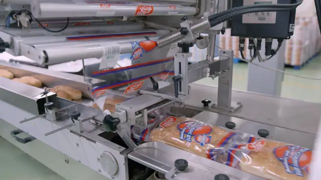Packaged Fonte buns moving along the production line